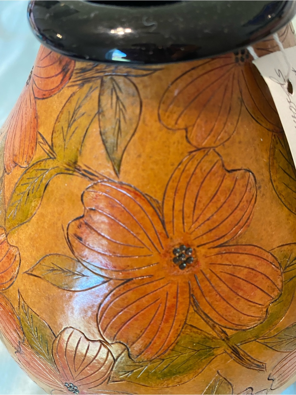 Orange Floral Decorative Vase with Green Leaf Accents